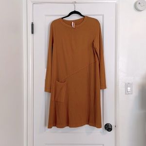 Ischiko geometric, asymmetrical, knit knee-length dress.